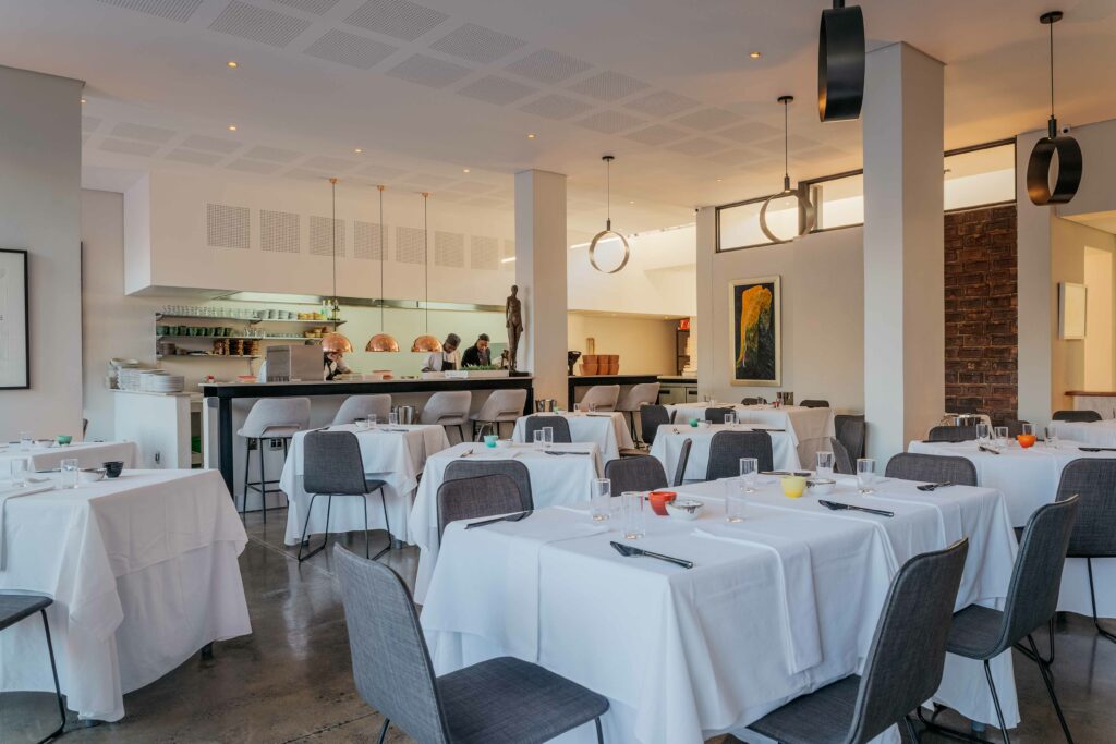 Interior of Est Est Alea, a fine dining restaurant in Johannesburg, designed by Principia Design.