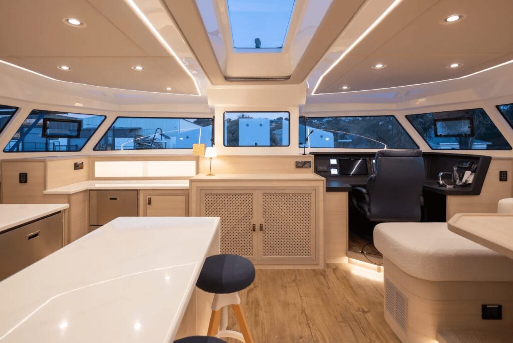 Dining table and helm station aboard Blue Jacket II