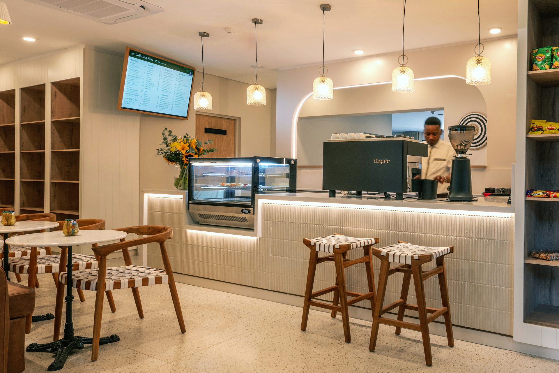Cafe at The Ark — terrazzo counter, pendant lighting and timber bar stools